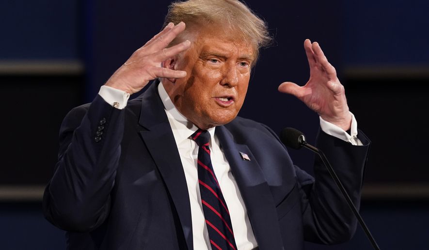 President Donald Trump gestures while speaking during the first presidential debate Tuesday, Sept. 29, 2020, at Case Western University and Cleveland Clinic, in Cleveland, Ohio. (AP Photo/Patrick Semansky)
