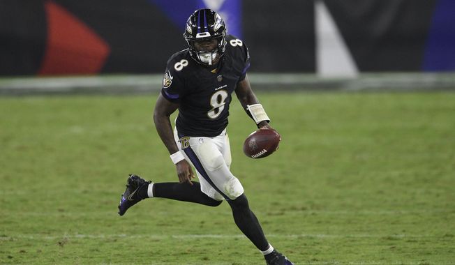 Baltimore Ravens quarterback Lamar Jackson (8) runs with the ball during the second half of an NFL football game against the Kansas City Chiefs, Monday, Sept. 28, 2020, in Baltimore. The Chiefs won 34-20. (AP Photo/Nick Wass)