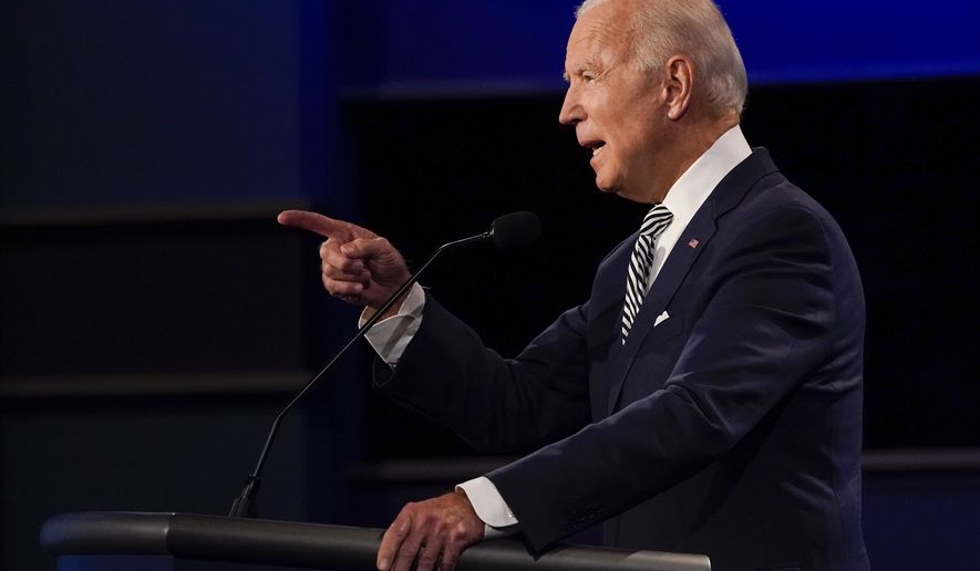 Democratic presidential candidate former Vice President Joe Biden gestures while speaking during the first presidential debate Tuesday, Sept. 29, 2020, at Case Western University and Cleveland Clinic, in Cleveland, Ohio. (AP Photo/Julio Cortez)
