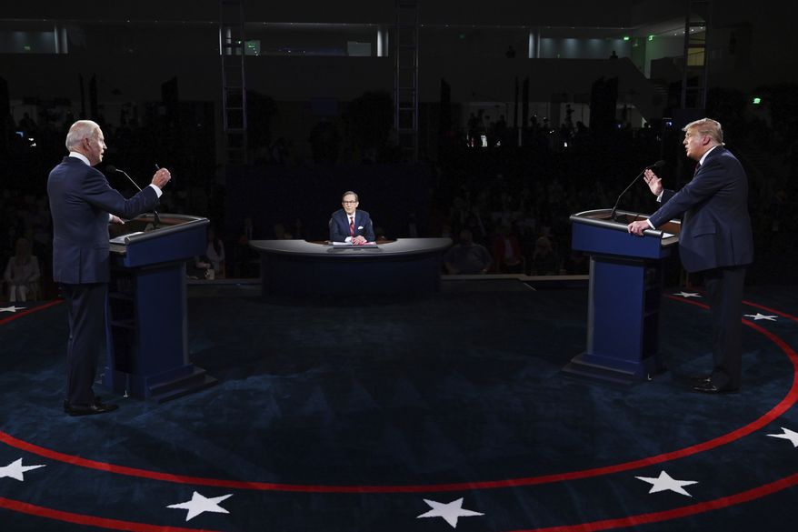 President Donald Trump and Democratic presidential candidate former Vice President Joe Biden participate in the first presidential debate Tuesday, Sept. 29, 2020, at Case Western University and Cleveland Clinic, in Cleveland. (Olivier Douliery/Pool vi AP)