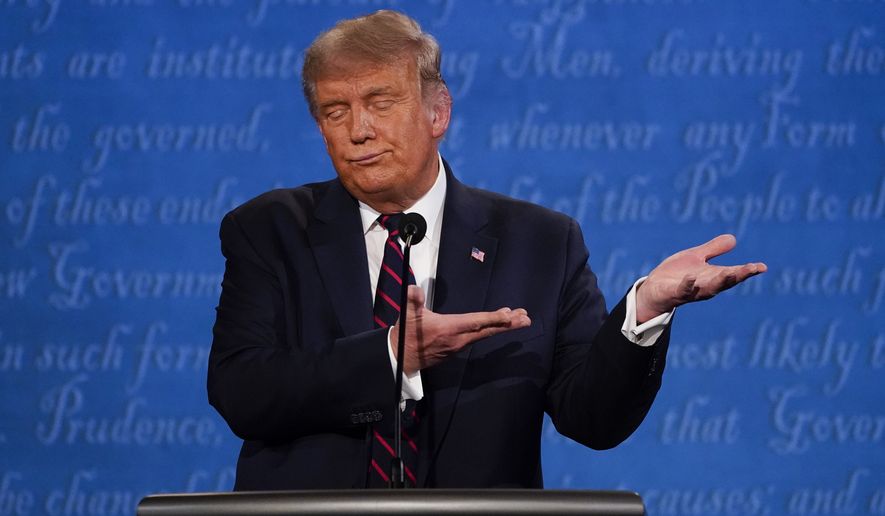 President Donald Trump gestures while speaking during the first presidential debate Tuesday, Sept. 29, 2020, at Case Western University and Cleveland Clinic, in Cleveland, Ohio. (AP Photo/Julio Cortez)