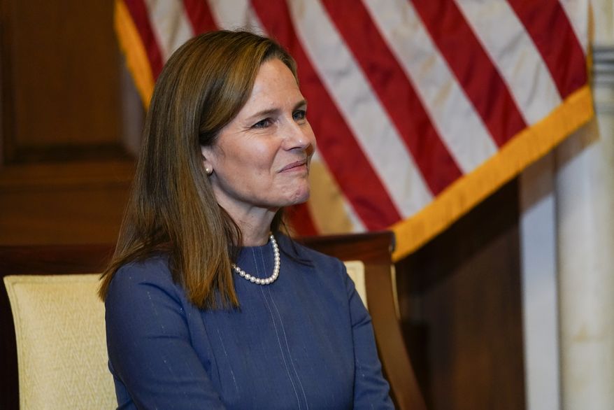 Judge Amy Coney Barrett, President Donald Trumps nominee for the U.S. Supreme Court, meets with Sen. Rick Scott, R-Fla., not pictured, on Capitol Hill in Washington, Tuesday, Sept. 29, 2020. (AP Photo/Susan Walsh, Pool)
