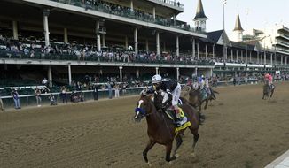 Jockey John Velazquez riding Authentic, wins the 146th running of the Kentucky Derby at Churchill Downs, Saturday, Sept. 5, 2020, in Louisville, Ky. (AP Photo/Jeff Roberson)