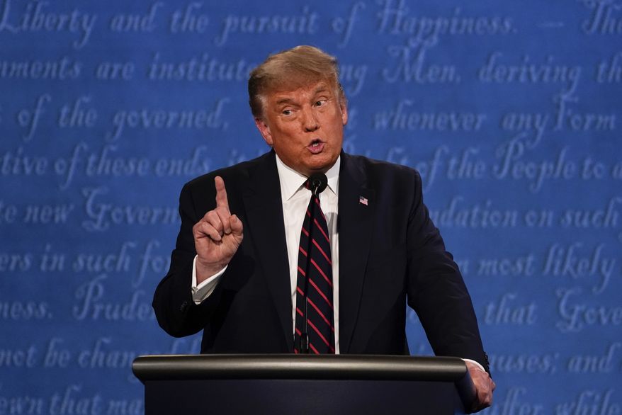 President Donald Trump gestures while speaking during the first presidential debate Tuesday, Sept. 29, 2020, at Case Western University and Cleveland Clinic, in Cleveland, Ohio. (AP Photo/Julio Cortez)