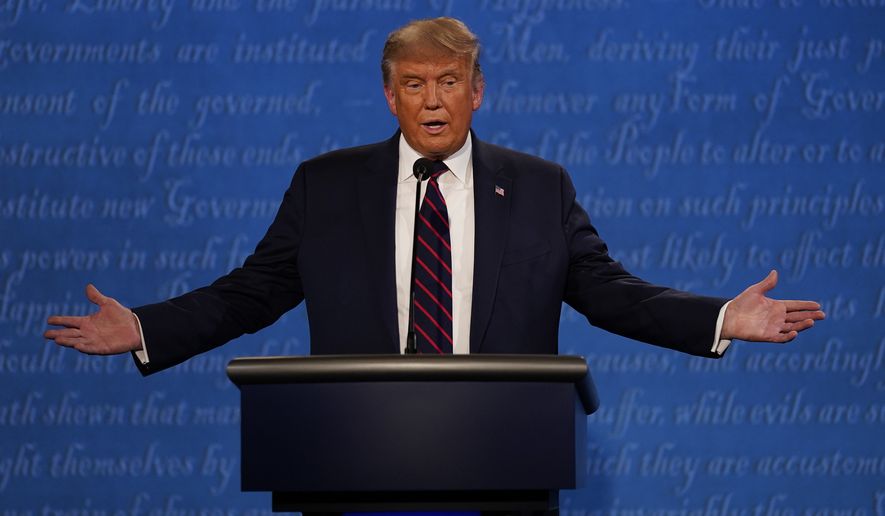 President Donald Trump gestures while speaking during the first presidential debate Tuesday, Sept. 29, 2020, at Case Western University and Cleveland Clinic, in Cleveland, Ohio. (AP Photo/Julio Cortez)