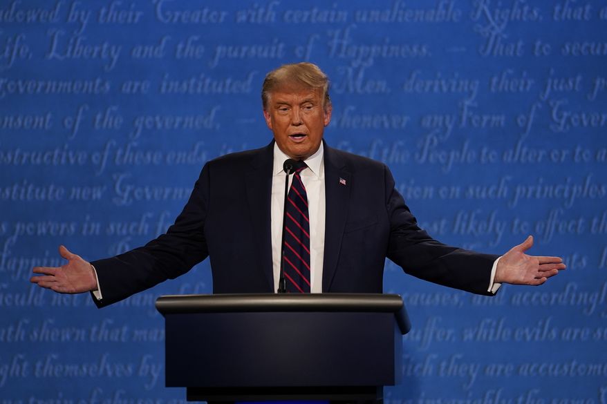 President Donald Trump gestures while speaking during the first presidential debate Tuesday, Sept. 29, 2020, at Case Western University and Cleveland Clinic, in Cleveland, Ohio. (AP Photo/Julio Cortez)