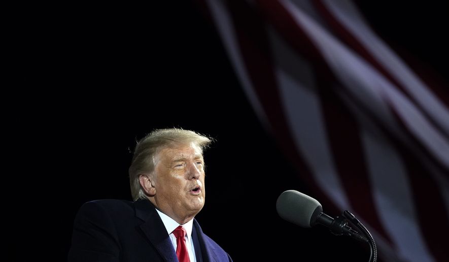 President Donald Trump speaks at a campaign rally at Duluth International Airport, Wednesday, Sept. 30, 2020, in Duluth, Minn. (AP Photo/Alex Brandon)