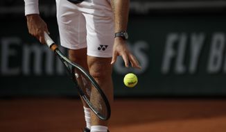 Switzerland&#x27;s Stan Wawrinka serves against Germany&#x27;s Dominik Koepfer in the second round match of the French Open tennis tournament at the Roland Garros stadium in Paris, France, Wednesday, Sept. 30, 2020. (AP Photo/Alessandra Tarantino)