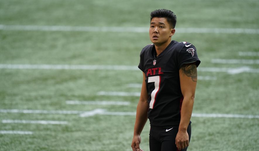 Atlanta Falcons kicker Younghoe Koo (7) warms up before the first half of an NFL football game between the Atlanta Falcons and the Chicago Bears, Sunday, Sept. 27, 2020, in Atlanta. (AP Photo/Brynn Anderson)