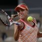 Sofia Kenin of the U.S. plays a shot against Romania&#39;s Ana Bogdan in the second round match of the French Open tennis tournament at the Roland Garros stadium in Paris, France, Thursday, Oct. 1, 2020. (AP Photo/Alessandra Tarantino)