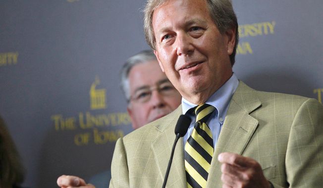 FILE - In this Sept. 3, 2015, file photo, Bruce Harreld speaks to media after he was introduced as the new University of Iowa president during a news conference in Iowa City, Iowa. Harreld announced plans on Thursday, Oct. 1, 2020, to retire after the school&#x27;s board finds his successor. Harreld, a former corporate executive and Harvard Business School instructor, has led the Big Ten university since 2015. (David Scrivner/Iowa City Press-Citizen via AP, File)