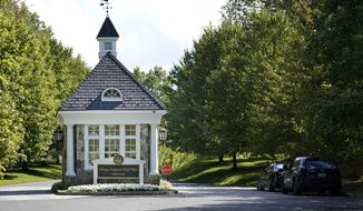 The entrance to Trump National Golf Club is seen in Bedminster, N.J., Friday, Oct. 2, 2020.  With just a month to go until the election, President Donald Trump had a busy schedule in the week before the coronavirus hit home with him. Trump tweeted early Friday that he and first lady Melania Trump had tested positive for the coronavirus.(AP Photo/Seth Wenig)