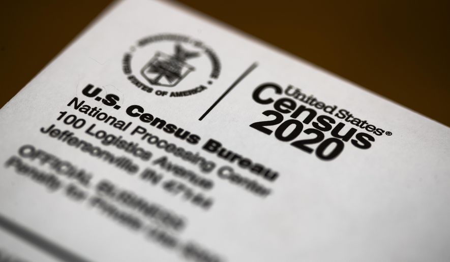FILE - In this March 19, 2020, file photo, is an envelope containing a 2020 census letter mailed to a U.S. resident. A complete count of Montana’s households could come with a big reward: a second seat in Congress and millions of federal dollars annually. But the 2020 census deadline remains in flux, making it uncertain if census takers will finish counting the vast, rural state. (AP Photo/Matt Rourke, File)