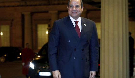 FILE - In this Jan. 20, 2020 file photo, Egypt&#39;s President Abdel Fattah al-Sisi arrives at Buckingham Palace for a reception to mark the UK-Africa Investment Summit in London.  A global watchdog and human rights lawyers on Friday, Oct. 2, 2020,  say that Egyptian authorities have arrested hundreds of people in their effort to clamp down on a spate of small but exceptionally rare protests across the country. (Henry Nicholls/Pool Photo via AP, File )