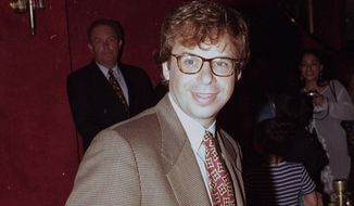 In this May 1994 file photo, actor Rick Moranis is shown at an unknown location.  A law enforcement official tells the Associated Press that Moranis was sucker punched by an unknown assailant while walking Thursday, Oct. 1, 2020, on a sidewalk near New York’s Central Park.   Moranis took himself to the hospital and later went to a police station to report the incident, according to the official, who was not authorized to speak publicly about the incident and did so on condition of anonymity. (AP Photo/File)