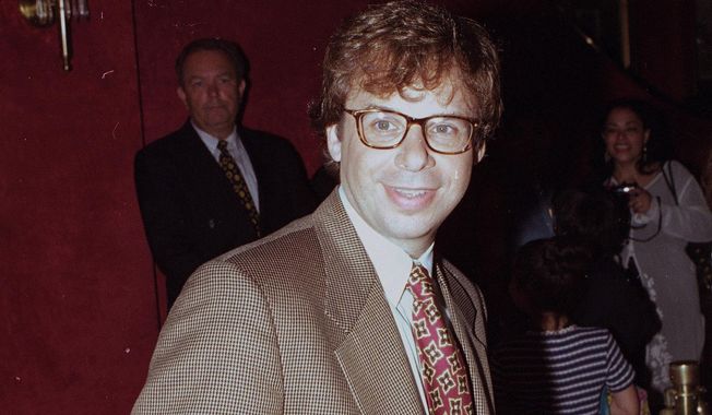 In this May 1994 file photo, actor Rick Moranis is shown at an unknown location.  A law enforcement official tells the Associated Press that Moranis was sucker punched by an unknown assailant while walking Thursday, Oct. 1, 2020, on a sidewalk near New York’s Central Park.   Moranis took himself to the hospital and later went to a police station to report the incident, according to the official, who was not authorized to speak publicly about the incident and did so on condition of anonymity. (AP Photo/File)
