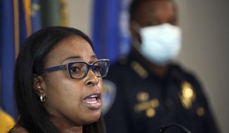 In this Sept. 2, 2020, photo, Mayor Lovely Warren, left, addresses the media in Rochester, N.Y., about the death of Daniel Prude. Top police leaders in Rochester, New York, have announced their retirements amid nightly protests over the handling of the suffocation death of Daniel Prude. (Jamie Germano/Democrat &amp;amp; Chronicle via AP)