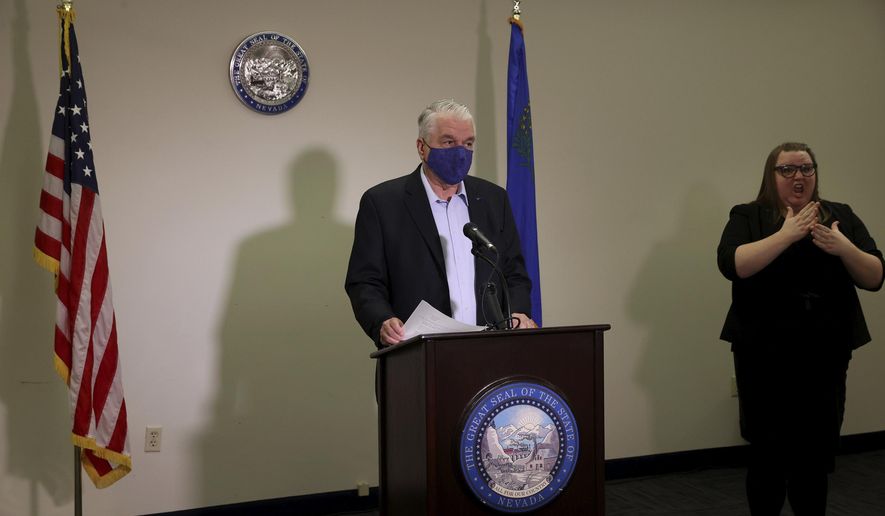 Nevada Gov. Steve Sisolak updates the state's COVID-19 response efforts and lifting of restrictions on youth and adult recreation sports during a news conference at the Sawyer Building in Las Vegas, Friday, Oct. 2, 2020. (K.M. Cannon/Las Vegas Review-Journal via AP, Pool)