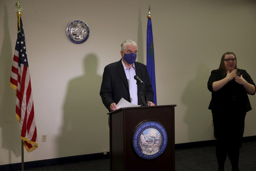 Nevada Gov. Steve Sisolak updates the state's COVID-19 response efforts and lifting of restrictions on youth and adult recreation sports during a news conference at the Sawyer Building in Las Vegas, Friday, Oct. 2, 2020. (K.M. Cannon/Las Vegas Review-Journal via AP, Pool)