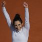 Italy&#39;s Martina Trevisan celebrates winning the fourth round match of the French Open tennis tournament against Netherlands&#39; Kiki Bertens in two sets, 6-4, 6-4, at the Roland Garros stadium in Paris, France, Sunday, Oct. 4, 2020. (AP Photo/Christophe Ena)