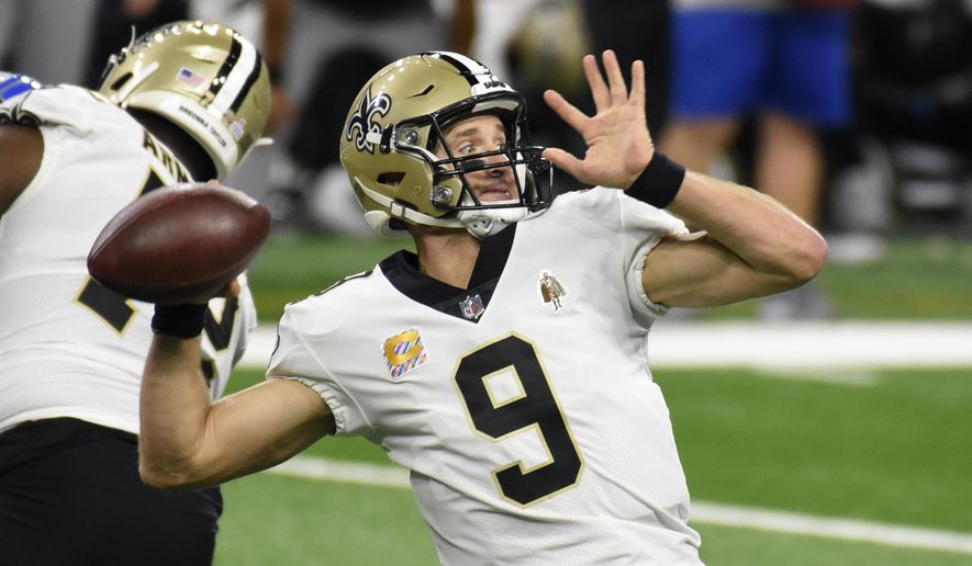 New Orleans Saints quarterback Drew Brees throws during the first half of an NFL football game against the Detroit Lions, Sunday, Oct. 4, 2020, in Detroit. (AP Photo/Jose Juarez)