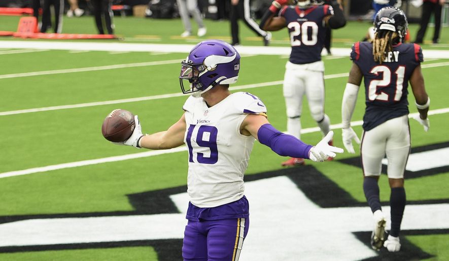 Minnesota Vikings wide receiver Adam Thielen (19) celebrates after a touchdown catch against the Houston Texans during the second half of an NFL football game Sunday, Oct. 4, 2020, in Houston. (AP Photo/Eric Christian Smith)