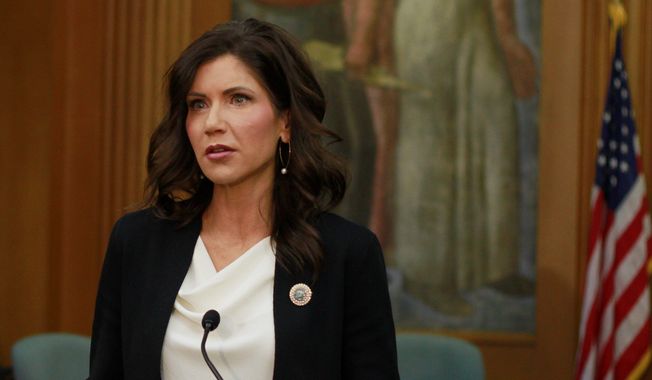 South Dakota Gov. Kristi Noem is basking in a national spotlight after keeping South Dakota open. She&#x27;s emerged as one to watch for a 2024 run. (Associated Press)