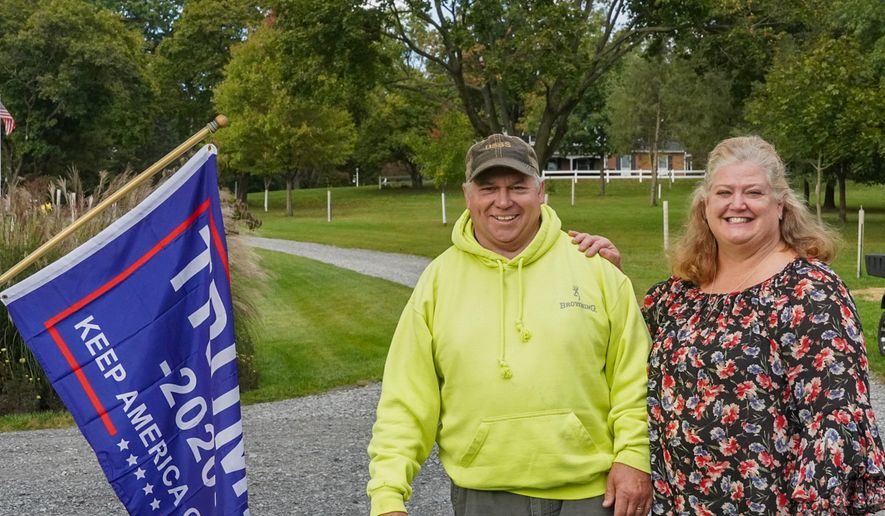 Trump supporters Meg and Rich Schlauch say their way of life is at stake in the presidential election. (Photo by Dave Boyer)