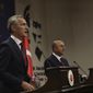 NATO Secretary-General Jens Stoltenberg, left, and Turkey&#x27;s Foreign Minister Mevlut Cavusoglu speak to the media after their talks in Ankara, Turkey, Monday, Oct. 5, 2020. Stoltenberg said the 30-country military alliance is &quot;deeply concerned by the escalation of hostilities &quot; between Azerbaijan and Armenia and he urged Turkey to help end the fighting. (AP Photo/Burhan Ozbilici)