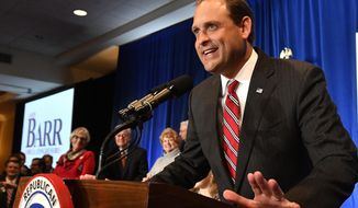FILE - In this Tuesday, Nov. 6, 2018, file photo, Rep. Andy Barr, R-Ky., speaks to supporters at his victory celebration in Lexington, Ky. Barr faces Democratic challenger Josh Hicks in a televised debate, Monday, Oct. 5, 2020, in the hotly contested race in Kentucky’s 6th District. (AP Photo/Timothy D. Easley, File)