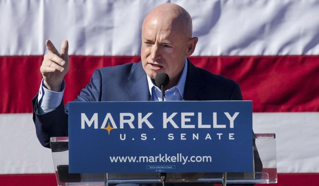 FILE - In this Feb. 23, 2019, file photo, Mark Kelly speaks during his senate campaign kickoff event in Tucson, Ariz. Republican Sen. Martha McSally and Democratic challenger Kelly meet Tuesday, Oct. 6, 2020, in what’s likely to be the only debate of the campaign. (Mike Christy/Arizona Daily Star via AP)