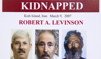 In this March 6, 2012, file photo, an FBI poster showing a composite image of former FBI agent Robert Levinson, right, of how he would look like now after five years in captivity, and an image, center, taken from the video, released by his kidnappers, and a picture before he was kidnapped, left, displayed during a news conference in Washington. A U.S. judge ordered Iran on Thursday, Oct. 1, 2020, to pay $1.45 billion to Levinson&#39;s family, who is believed to have been kidnapped by the Islamic Republic while on an unauthorized CIA mission to an Iranian island in 2007. (AP Photo/Manuel Balce Ceneta, File)