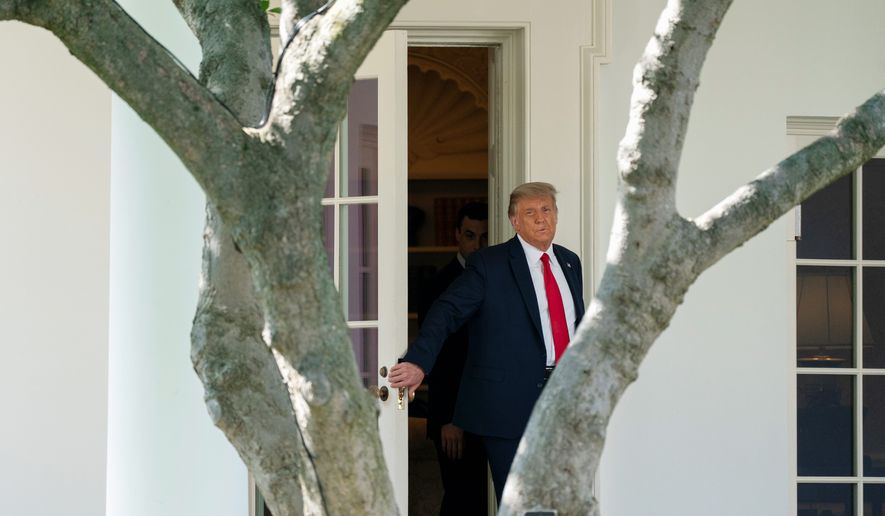 President Trump is shown here in a Sept. 30, 2020 file photo walking out of the Oval Office. (Associated Press)  **FILE**