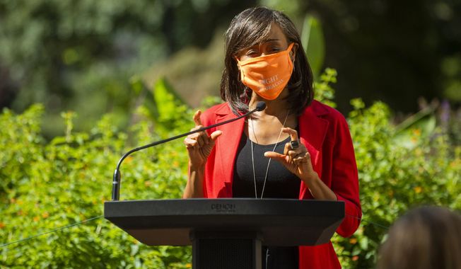 Zena Howard, principal and managing director of the architecture firm Perkins+Will, speaks during a ground breaking ceremony for the new North Carolina Freedom Park, located between the North Carolina State Legislative Building and the Governor&#x27;s Mansion, and designed by the late architect Phil Freelon, on Wednesday, Oct. 7, 2020, in Raleigh, N.C. (Casey Toth/The News &amp;amp; Observer via AP)