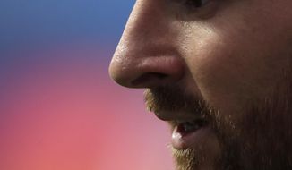 Barcelona&#39;s Lionel Messi during the Champions League quarterfinal match between FC Barcelona and Bayern Munich at the Luz stadium in Lisbon, Portugal, Friday, Aug. 14, 2020. (AP Photo/Manu Fernandez/Pool)