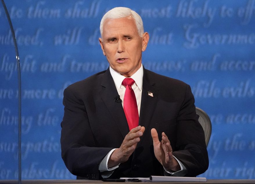 Vice President Mike Pence speaks during the vice presidential debate Democratic vice presidential candidate Sen. Kamala Harris, D-Calif., Wednesday, Oct. 7, 2020, at Kingsbury Hall on the campus of the University of Utah in Salt Lake City. (AP Photo/Julio Cortez)