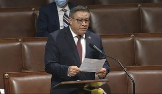 FILE - In this April 23, 2020, file image taken from video, Rep. Salud Carbajal, D-Calif., speaks on the floor of the House of Representatives at the U.S. Capitol in Washington. The office of Rep. Carbajal said Tuesday, Oct. 6, 2020, that he tested positive for the coronavirus after coming into passing contact with Sen. Mike Lee, a Utah Republican, who is among a growing number of lawmakers and White House staff now confirmed to have the virus. (House Television via AP, File)
