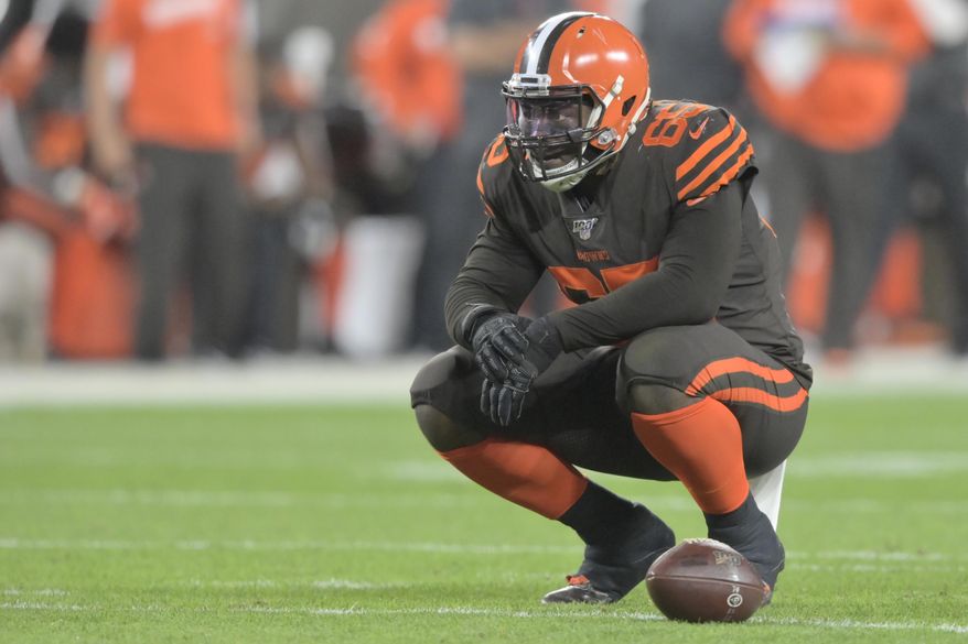 FILE - In this Sept. 22, 2019, file photo, Cleveland Browns defensive tackle Larry Ogunjobi (65) reacts during an NFL football game against the Los Angeles Rams in Cleveland. The Browns will be without one of their best defensive players Sunday against Indianapolis as Ogunjobi will sit out with an abdominal injury. (AP Photo/David Richard, File)