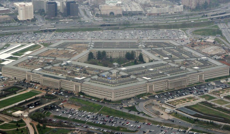 This March 27, 2008, file photo shows the Pentagon in Washington. (AP Photo/Charles Dharapak, File)
