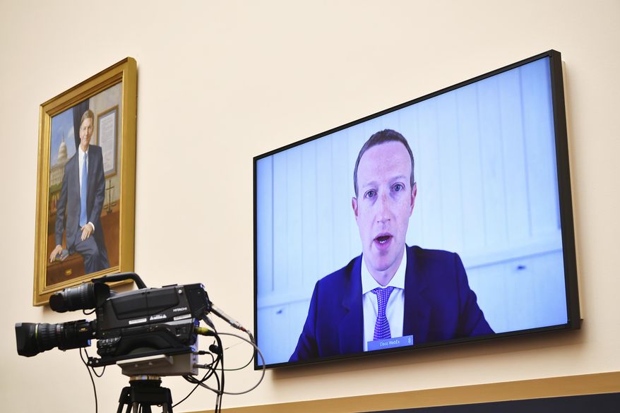 Facebook CEO Mark Zuckerberg testifies remotely during a House Judiciary subcommittee on antitrust on Capitol Hill on Wednesday, July 29, 2020, in Washington. (Mandel Ngan/Pool via AP) ** FILE **