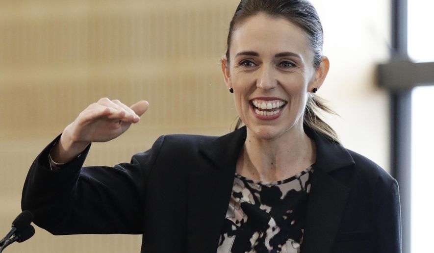 FILE - In this June 25, 2020, file photo, New Zealand Prime Minister Jacinda Ardern gestures during the opening ceremony for Redcliffs School in Christchurch, New Zealand. Prime Minister Ardern has voted in the nation’s general election, a week before polls officially close. Ardern cast her vote in her Auckland district Saturday, Oct. 10, after visiting a market in the heavily Polynesian south Auckland suburb of Otara, where she was thronged by supporters.(AP Photo/Mark Baker, File)