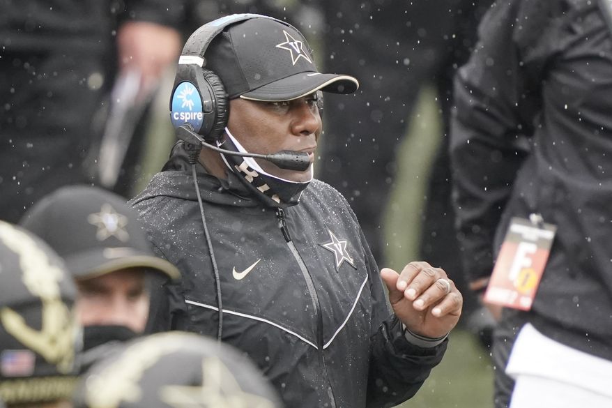 Vanderbilt head coach Derek Mason watches from the sideline in the first half of an NCAA college football game against South Carolina Saturday, Oct. 10, 2020, in Nashville, Tenn. (AP Photo/Mark Humphrey) **FILE**