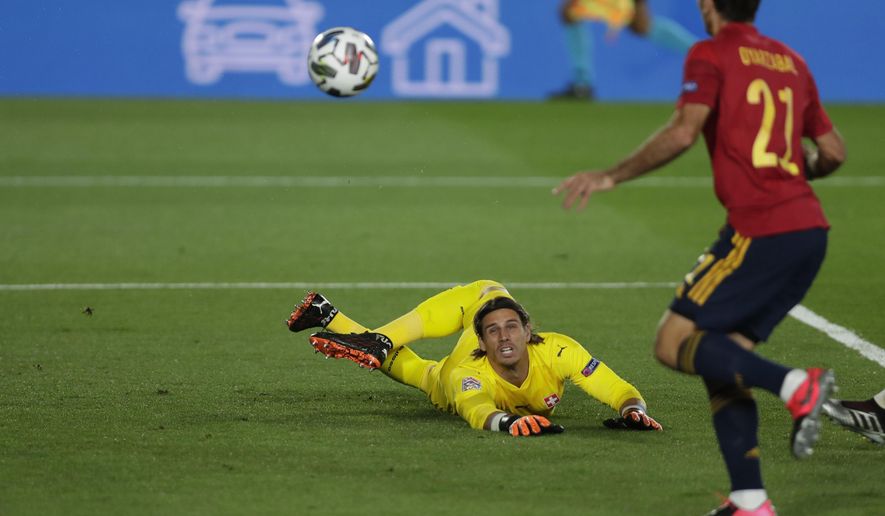 Switzerland&#39;s goalkeeper Yann Sommer watches as Spain&#39;s Oyarzabal goes to shoot at goal but fails to score after hitting the postduring the UEFA Nations League soccer match between Spain and Switzerland in Madrid, Spain, Saturday, Oct. 10, 2020. (AP Photo/Manu Fernandez)