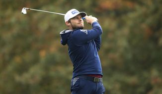 England&#39;s Tyrell Hatton on the first fairway during day four of the PGA Championship at Wentworth Club, Virginia Water, England, Sunday Oct. 11, 2020. (Adam Davy/PA via AP)