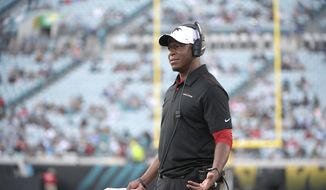  In this Aug. 19, 2019, file photo, Atlanta Falcons then-assistant head coach/passing game coordinator Raheem Morris watches from the sideline during the first half of a preseason NFL football game against the Jacksonville Jaguars, in Jacksonville, Fla. The Atlanta Falcons have named defensive coordinator Raheem Morris interim head coach after firing Dan Quinn.  (AP Photo/Phelan M. Ebenhack, File)  **FILE**