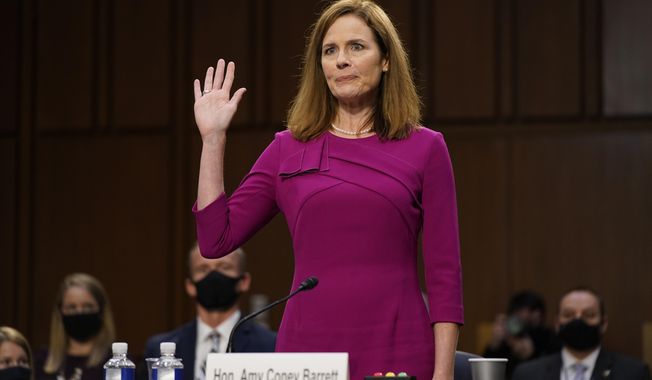 Supreme Court nominee Amy Coney Barrett is sworn in during a confirmation hearing before the Senate Judiciary Committee, Monday, Oct. 12, 2020, on Capitol Hill in Washington. (AP Photo/Patrick Semansky, Pool)