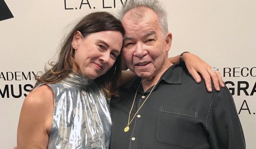 This 2018 photo provided by Fiona Prine shows Prine and her husband, John, in Los Angeles. Both battled COVID-19, but John lost his life to the disease. (Courtesy of Fiona Prine via AP)
