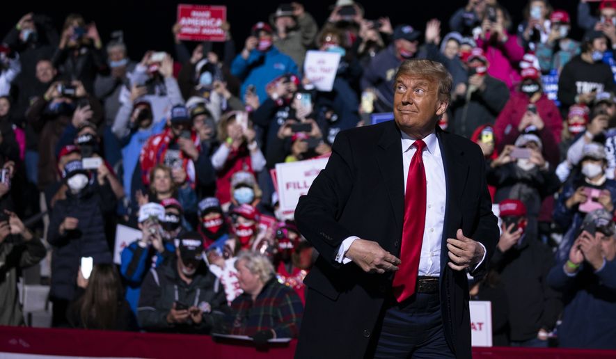President Donald Trump arrives for a campaign rally at John Murtha Johnstown-Cambria County Airport, Tuesday, Oct. 13, 2020, in Johnstown, Pa. (AP Photo/Evan Vucci)