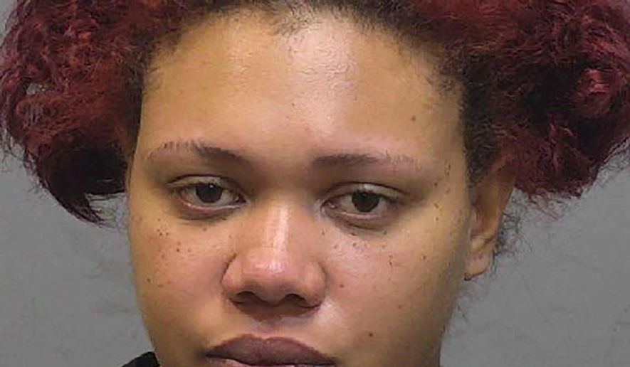 This photo provided by the New Haven Police Department shows Andiana Velez, of Hamden, Connecticut. Velez, 24, is charged with abandoning an 8-month-old girl in a trash bin and is expected to be arraigned in court Tuesday, Oct. 13, 2020, as authorities continued to investigate who was responsible for burns to the baby's hands. The girl was found alive in a bin outside a New Haven apartment complex on Monday and taken to Yale New Haven Children's Hospital, where she was reported in stable condition. (New Haven Police Department via AP)