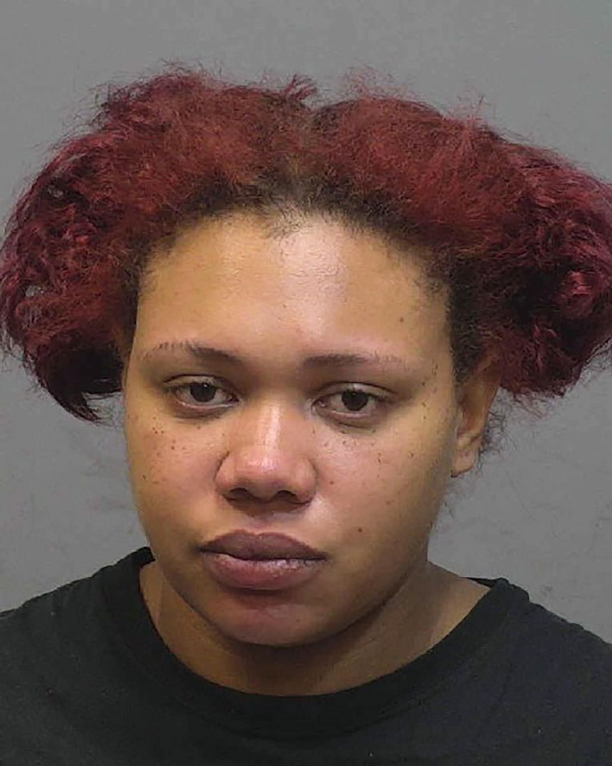 This photo provided by the New Haven Police Department shows Andiana Velez, of Hamden, Connecticut. Velez, 24, is charged with abandoning an 8-month-old girl in a trash bin and is expected to be arraigned in court Tuesday, Oct. 13, 2020, as authorities continued to investigate who was responsible for burns to the baby's hands. The girl was found alive in a bin outside a New Haven apartment complex on Monday and taken to Yale New Haven Children's Hospital, where she was reported in stable condition. (New Haven Police Department via AP)